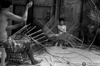 Craftmen making bamboo baskets