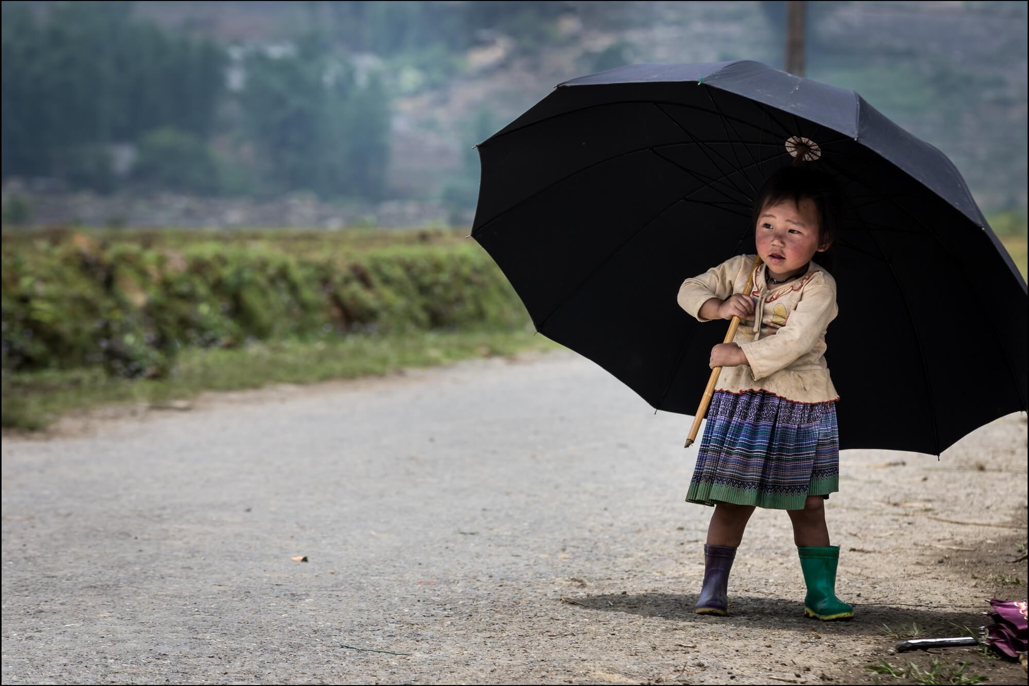 Vietnam Minority Child with black Umbrella