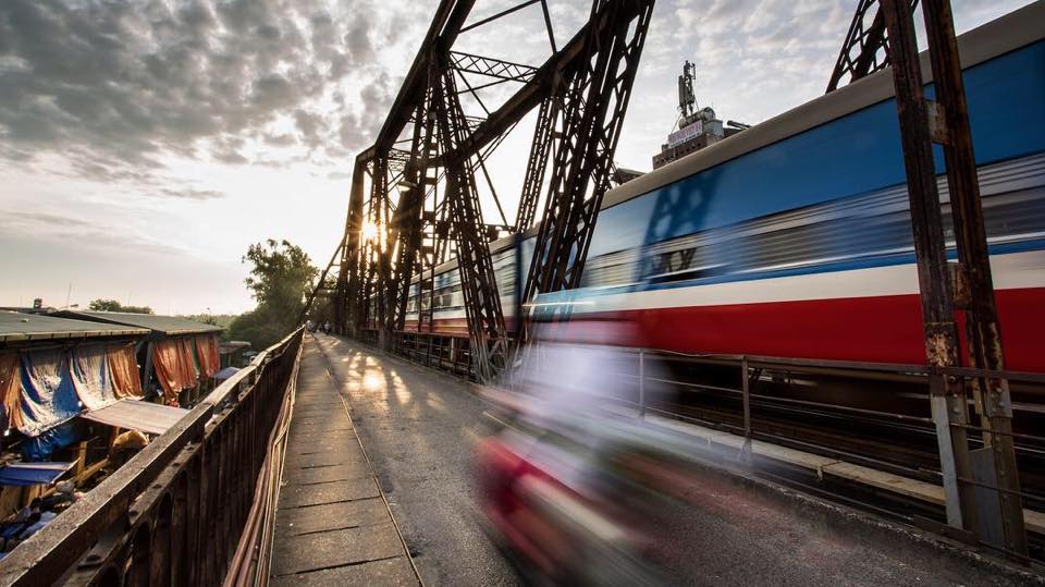 Passing Train and motorbike in Hanoi Vietnam