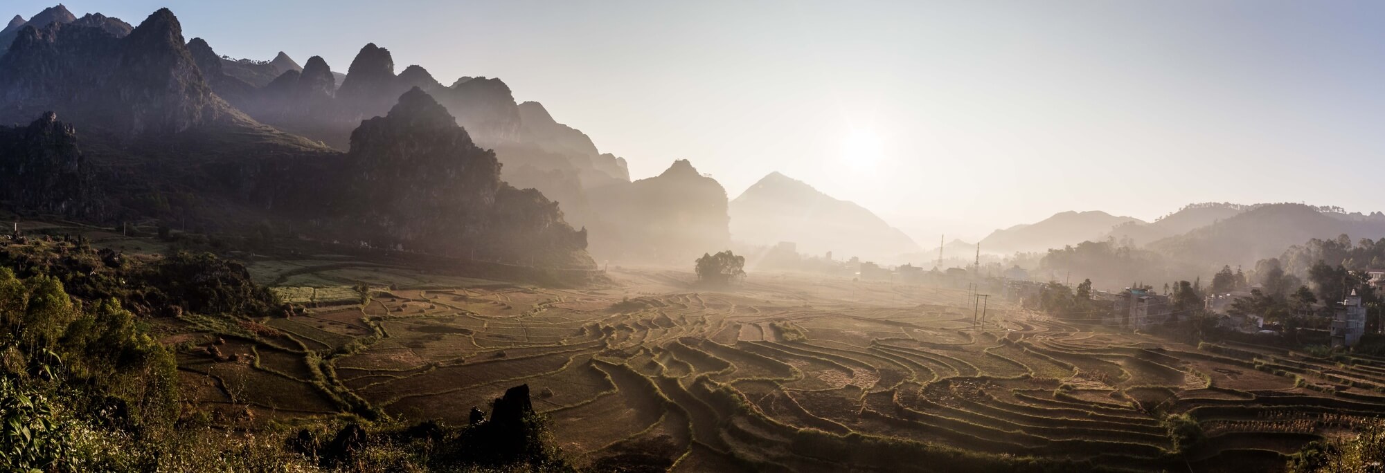 North Vietnam panorama landscape with dried up rice terraces and mountains North Vietnam panorama landscape with dried up rice terraces and mountains