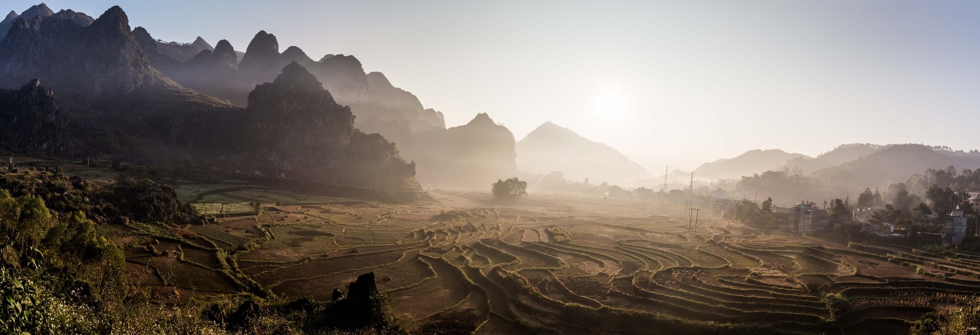 North Vietnam panorama landscape with dried up rice terraces and mountains