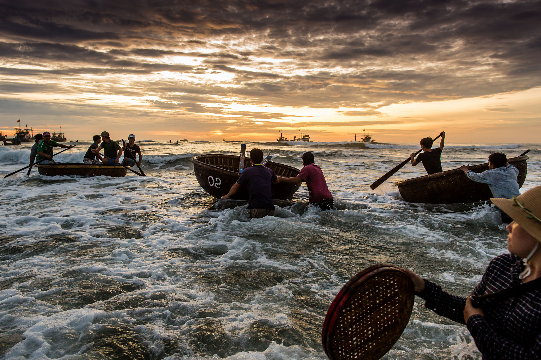 Fishermen from central Vietnam aboard bamboo coracles