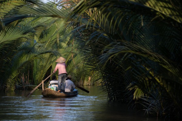 Woman rowing in an arroyo