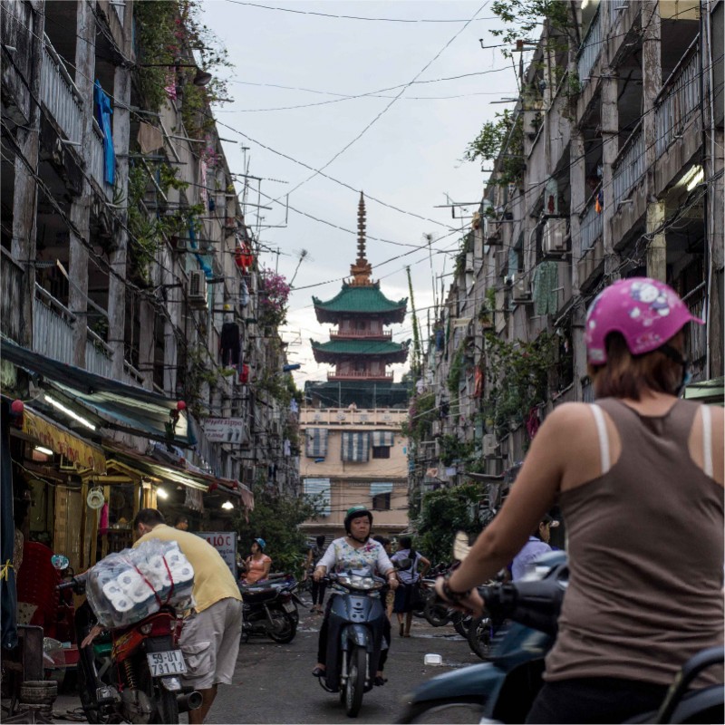 Vietnam alley with temple in the background